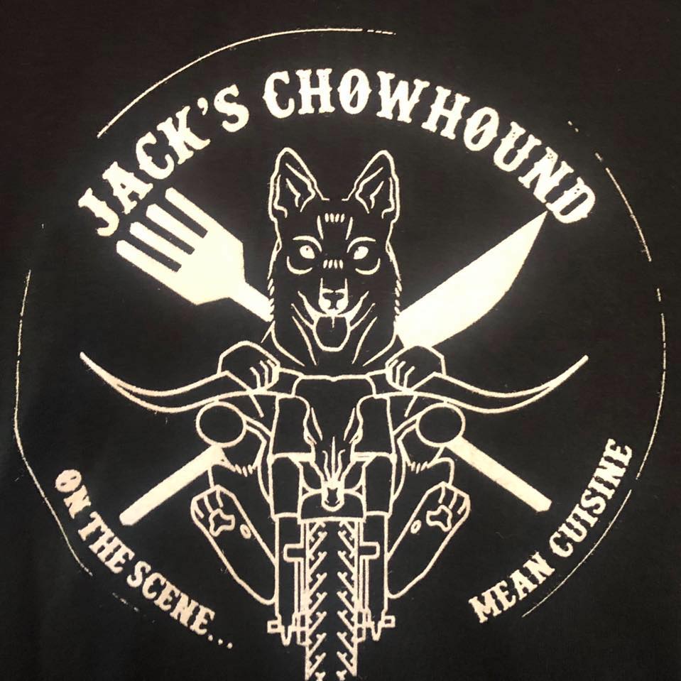 motorcycle with fork and knife behind it and jack's chowhound logo